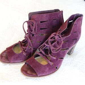 A pair of Vince Camuto shoes fall chunk heel / Tressa Bootie / Berry Suede